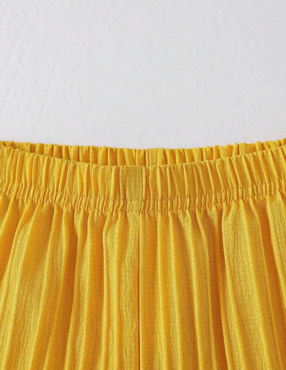 Sold color Spaghetti strap bowknot Raffle top With Straight pant
