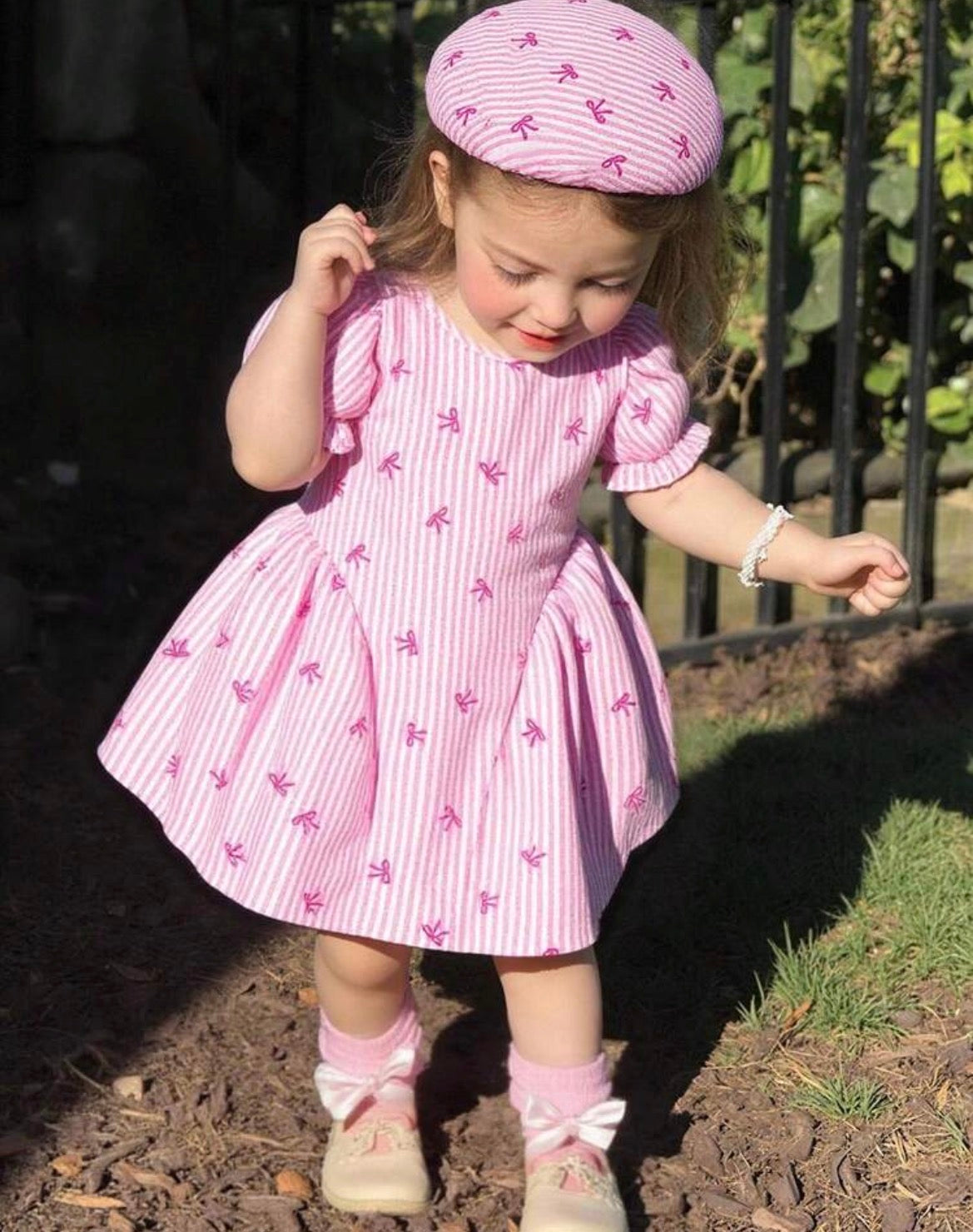 Pink And white Striped bow print