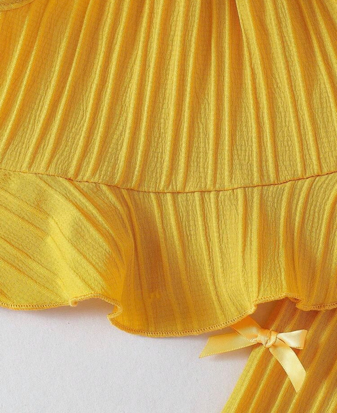 Sold color Spaghetti strap bowknot Raffle top With Straight pant