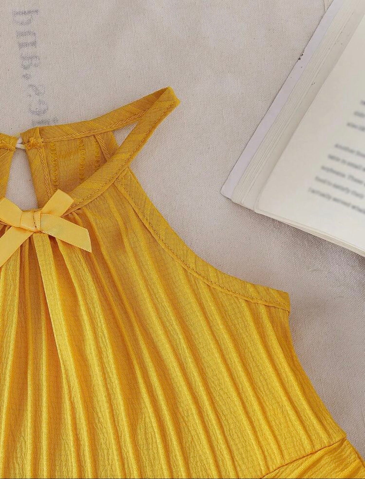 Sold color Spaghetti strap bowknot Raffle top With Straight pant