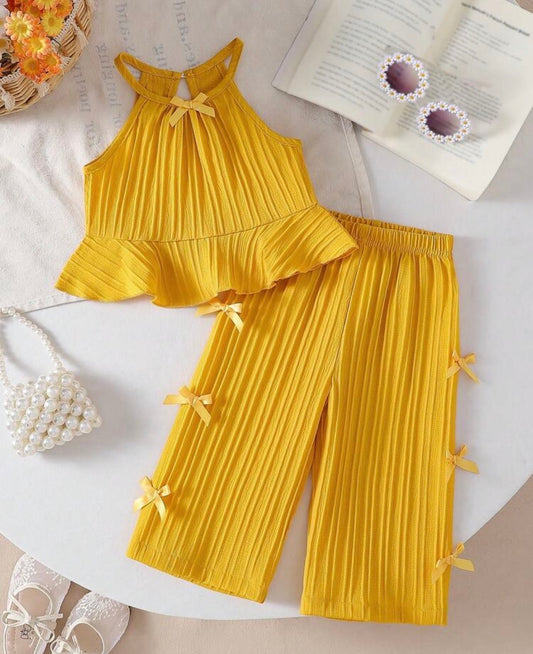 Sold color Spaghetti strap bowknot Raffle top With Straight pant