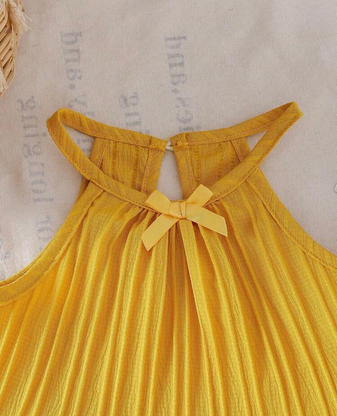 Sold color Spaghetti strap bowknot Raffle top With Straight pant